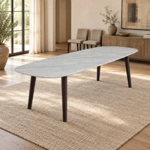 White Marble Dining Table on Splayed Black Legs in ivory — in a room setting
