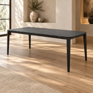 Black Marble Dining Table on Slim Angled Legs in black — in a room setting