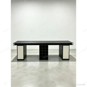 Black Dining Table with Built-In Wine Rack Base in black — in a room setting