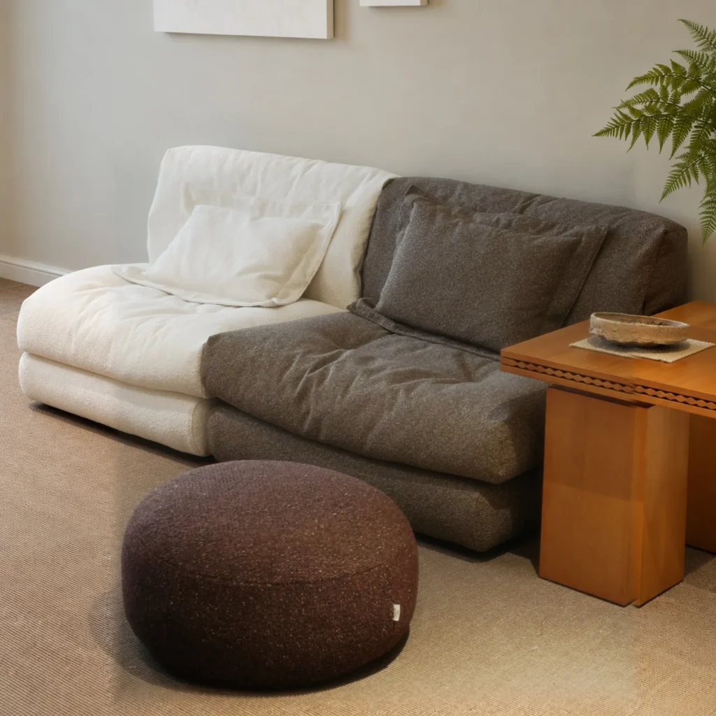 Floating Dot Round Pouf in Burgundy Textured Fabric — front view