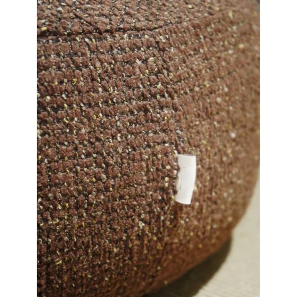 Floating Dot Round Pouf in Burgundy Textured Fabric — in a room setting