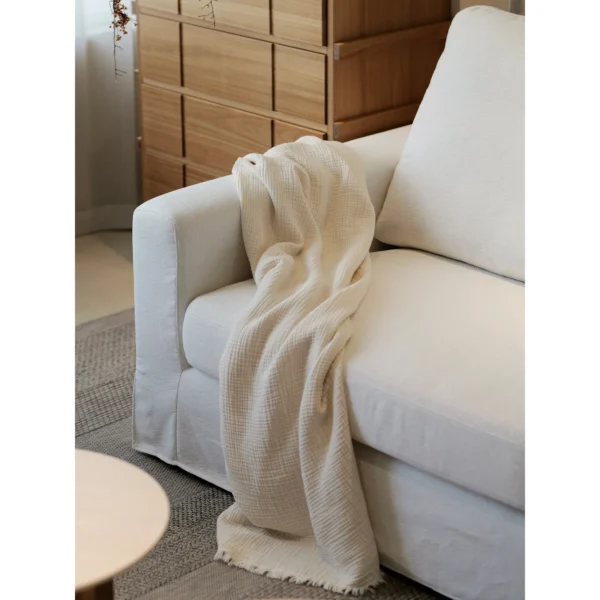 Floating Island Low-Base Sofa in ivory — in a room setting