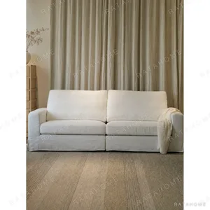Floating Island Low-Base Sofa in ivory — in a room setting
