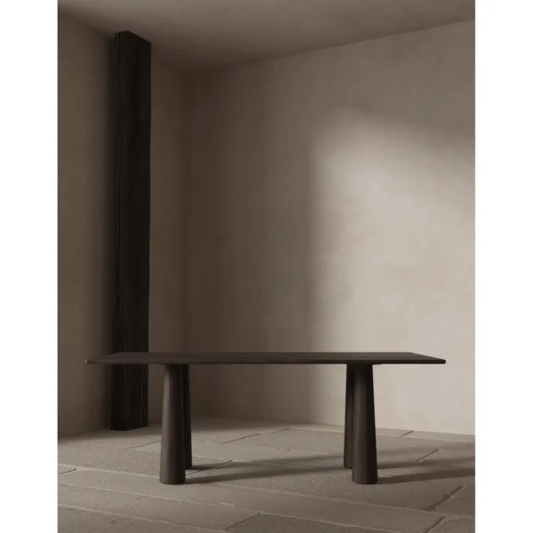 Wutong Black Walnut Dining Table with Sculpted Legs in walnut — in a room setting