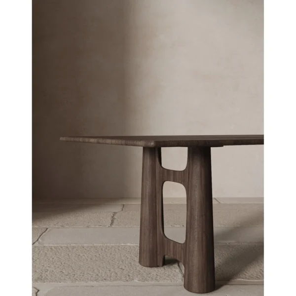 Wutong Black Walnut Dining Table with Sculpted Legs in walnut — in a room setting