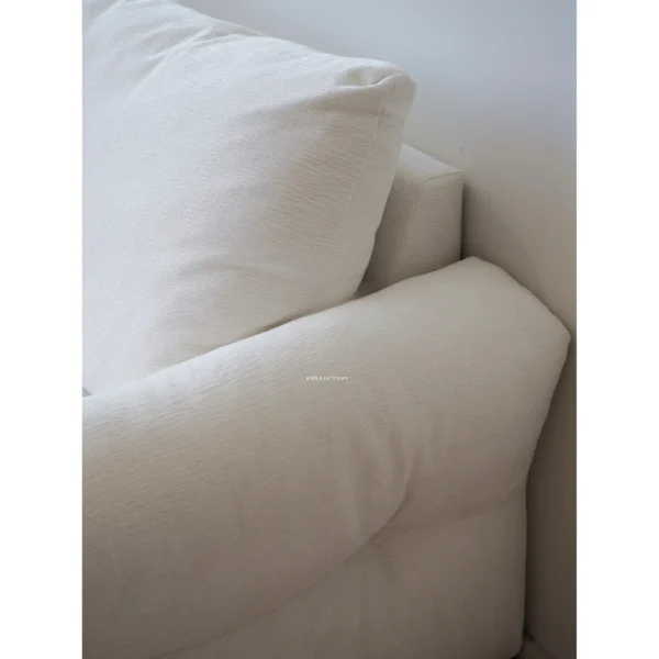 Zhiyu Woven Feather Sofa Bed in White with Curved Arms — in a room setting