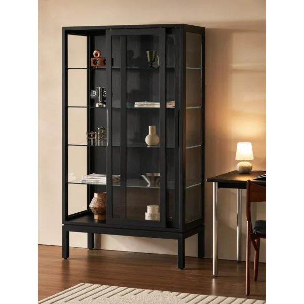 Black Glass-Door Display Cabinet for Collectibles in black — in a room setting