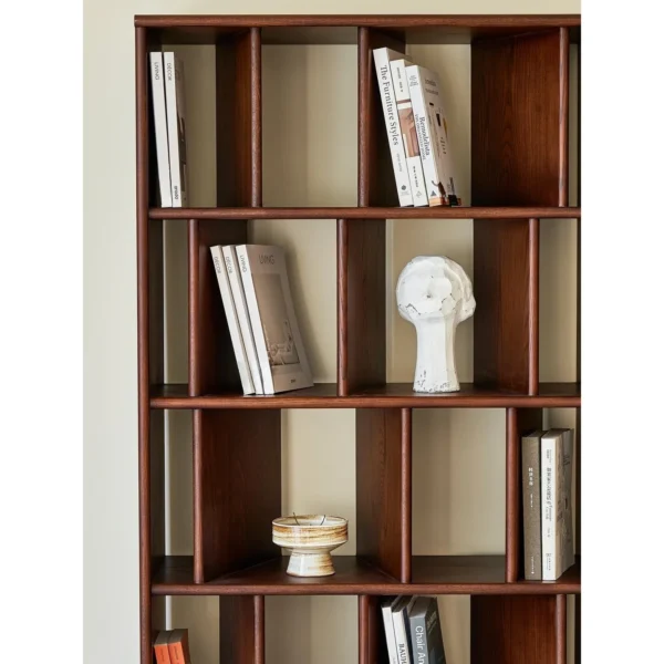 Black Glass-Door Display Cabinet for Collectibles in black — in a room setting