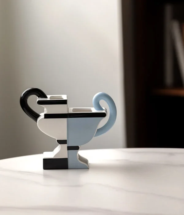 Postmodern Two-Tone Geometric Vase with Twin Loop Ears in ivory — in a room setting