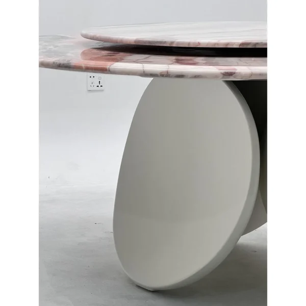 Pink Stone Round Table with Turntable on Twin-Leaf Base in rose stone — in a room setting