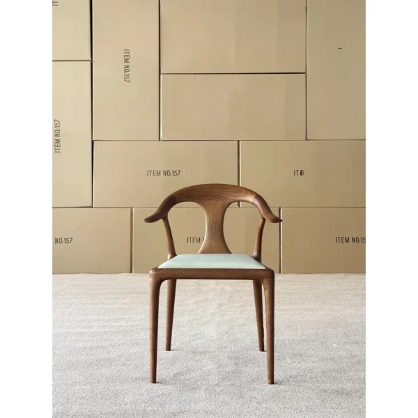 Duckbill Ash Dining Chair with Leather Seat, 61 cm in walnut — in a room setting