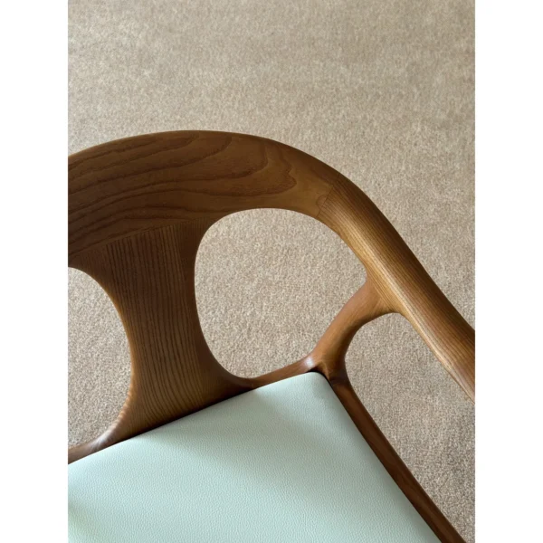 Duckbill Ash Dining Chair with Leather Seat, 61 cm in walnut — in a room setting