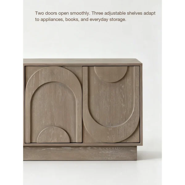 Dune Carved Washed Oak Cabinet in natural oak — in a room setting