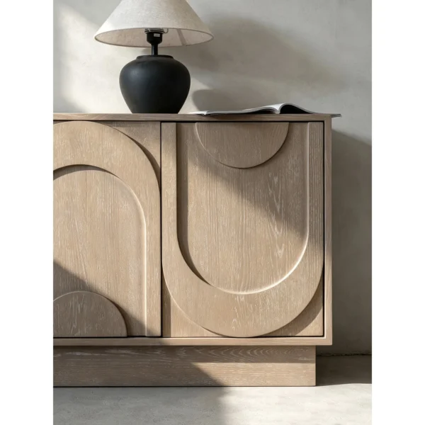 Dune Carved Washed Oak Cabinet in natural oak — in a room setting