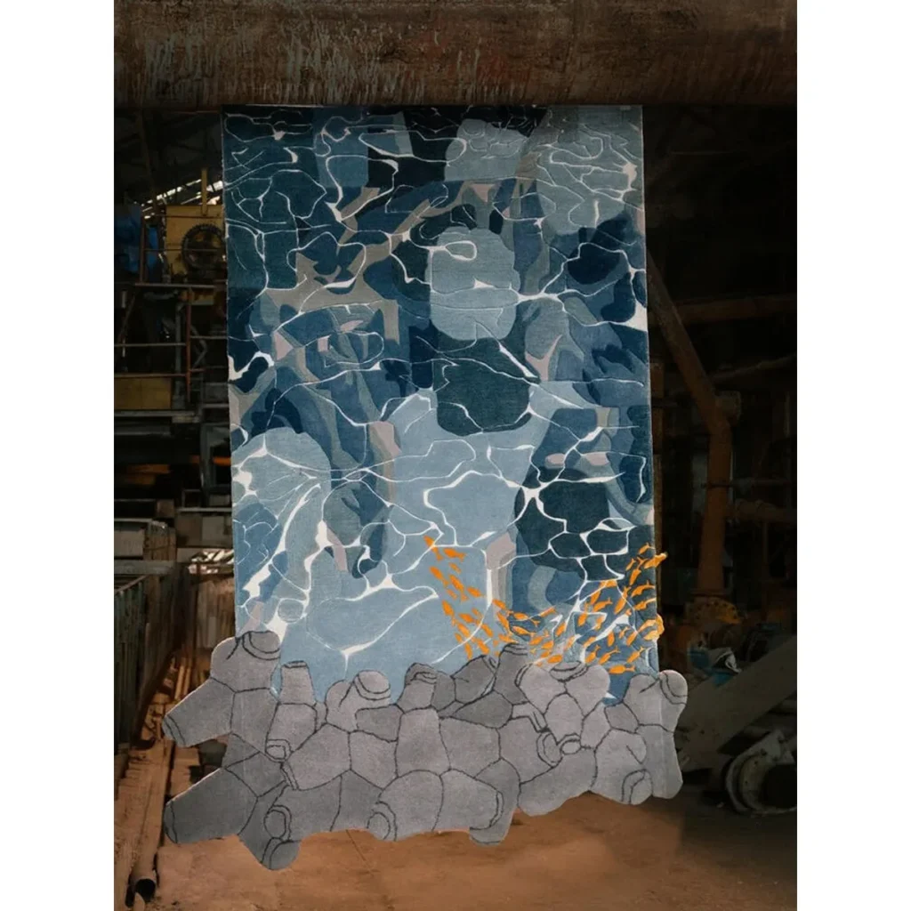 Ocean and Rock Story Rug in blue — front view