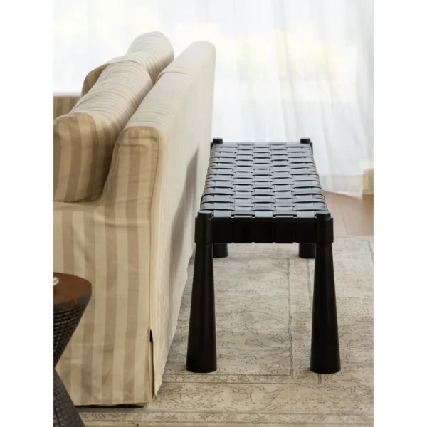 Hand-Woven Leather Teak Bench in black — in a room setting