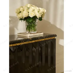 Eliana Diamond-Cut Sideboard with Marble Top and Gold Leaf in black — in a room setting