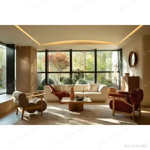 Embrace Curved-Arm Modular Sofa in Cream Blended Fabric — in a room setting