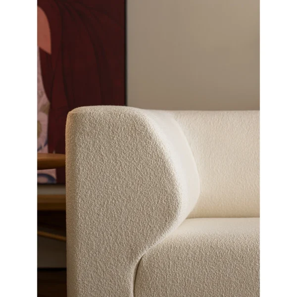 Embrace Curved-Arm Modular Sofa in Cream Blended Fabric — in a room setting