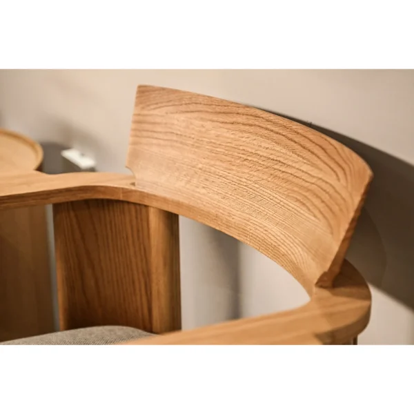 Embrace Solid Oak Armchair in natural oak — in a room setting