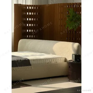Embrace Rounded Bouclé Bed with Full Wraparound Headboard in oatmeal — in a room setting