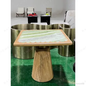 Emerald Green Stone Side Table on Fluted Oak Pedestal in olive — in a room setting
