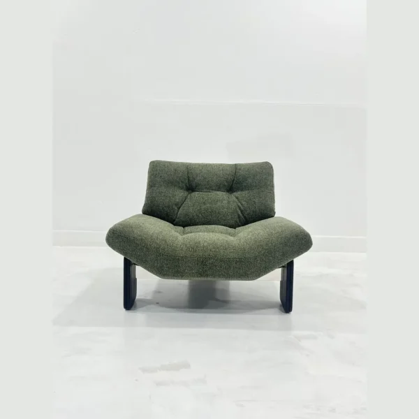 Wide-Seat Italian Lounge Chair in olive — in a room setting