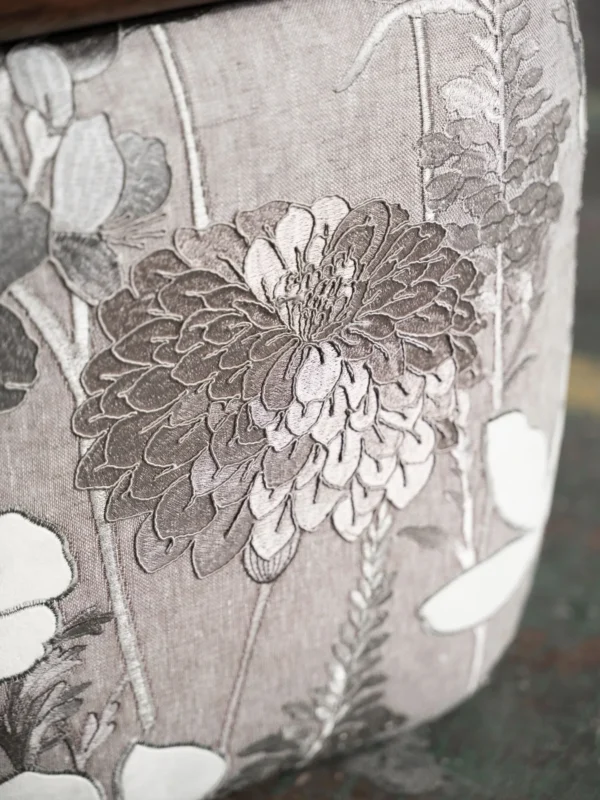Floral Upholstered Tea Stool with Walnut Saddle Top in slate — detail