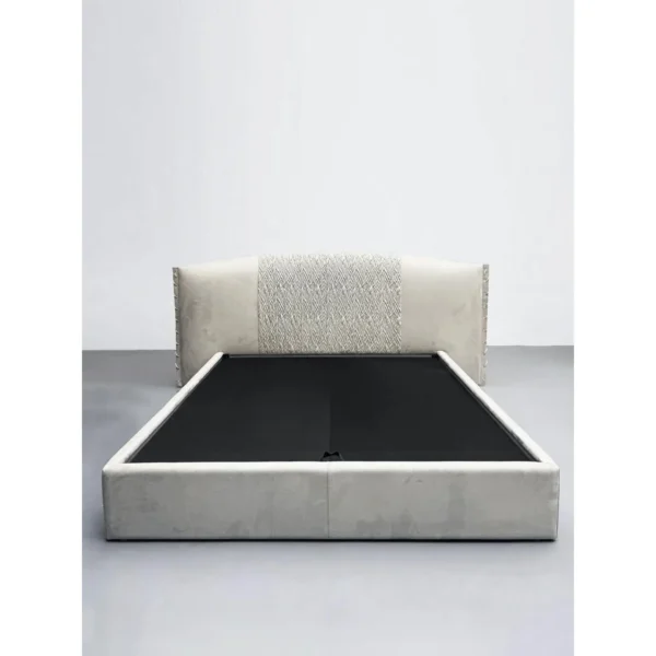 Hand-Woven Suede Headboard Bed with Stud Trim in oatmeal — in a room setting