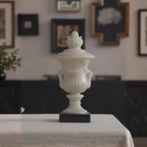 Jade-Effect Neoclassical Carved Lidded Urn with Lotus Finial in ivory — front view