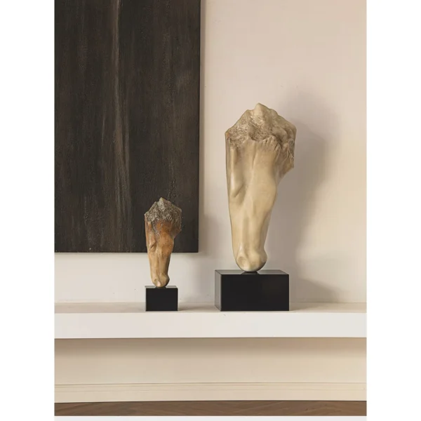 Jade-Effect Horse Head Fragment Sculptures on Black Bases in oatmeal — in a room setting