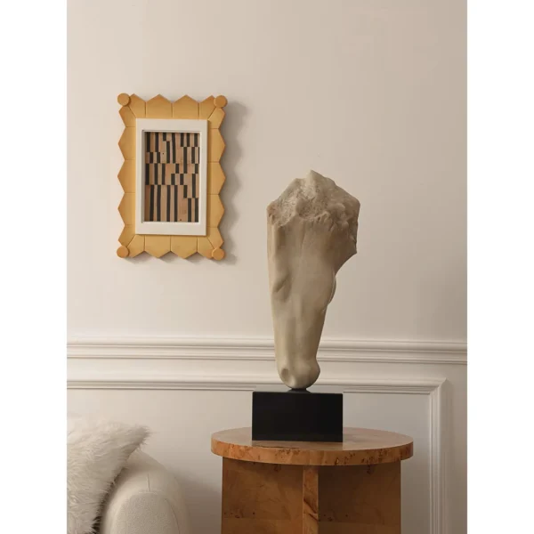 Jade-Effect Horse Head Fragment Sculptures on Black Bases in oatmeal — in a room setting