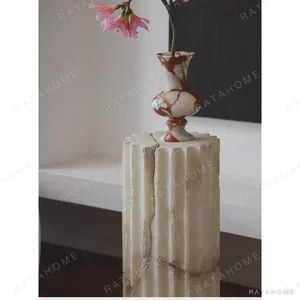 Fluted Faux Jade Column Pedestal with Greek Proportions in oatmeal — in a room setting