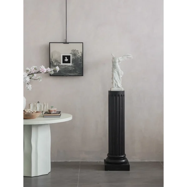 Jade-Effect Winged Victory Sculpture, Matte Finish in ivory — in a room setting