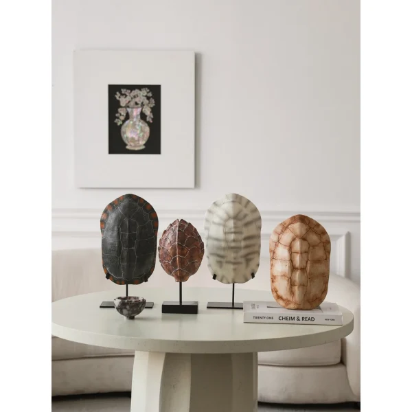 Hand-Painted Faux Tortoise Shell Ornaments in clay — in a room setting