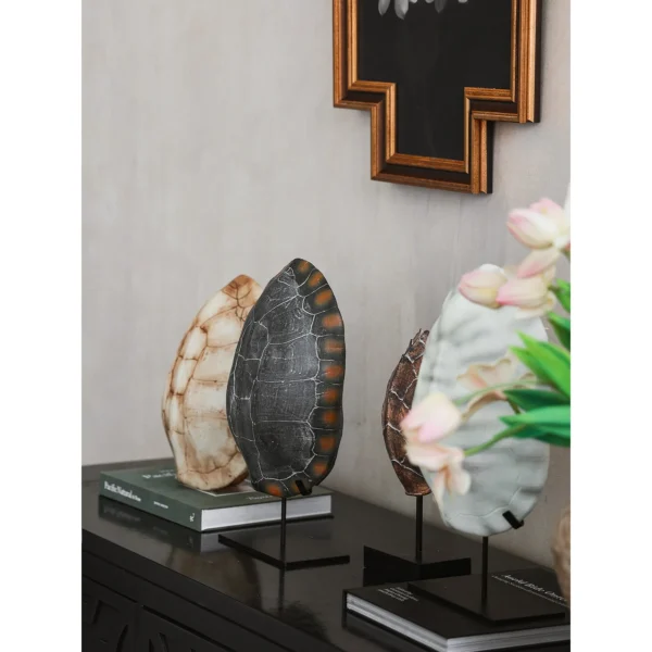 Hand-Painted Faux Tortoise Shell Ornaments in clay — in a room setting
