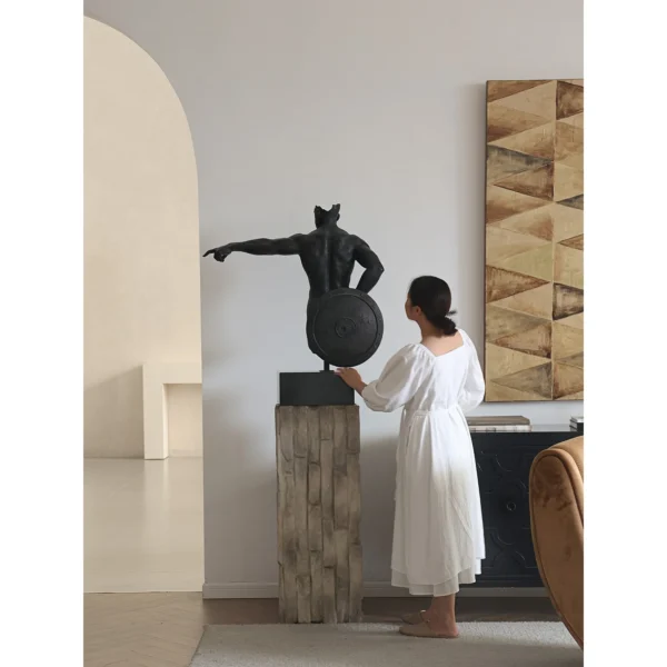 Fearless Warrior Torso Sculpture in Antique Bronze Finish — in a room setting
