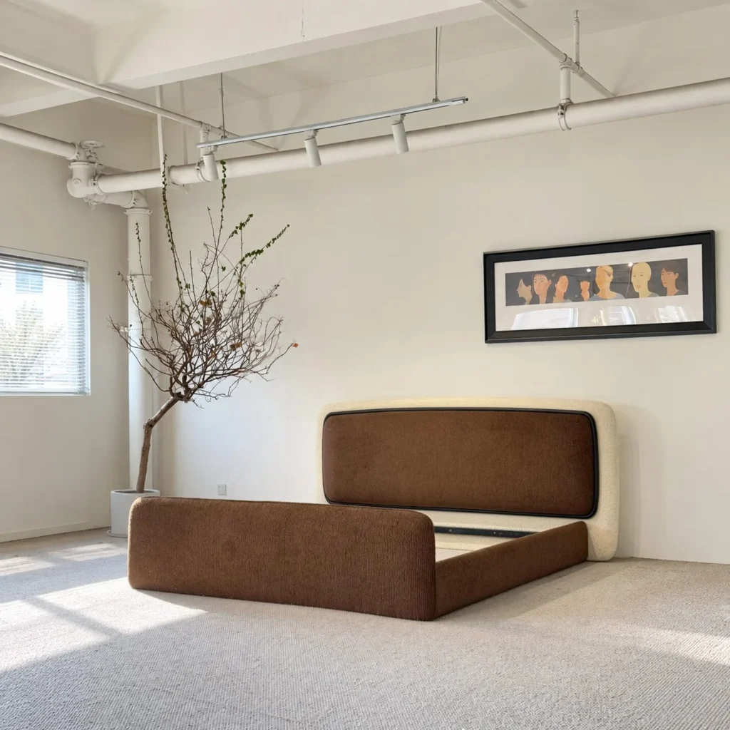Cloud Curved Fabric-Wrapped Bed in Chocolate — front view