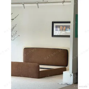 Cloud Curved Fabric-Wrapped Bed in Chocolate — in a room setting