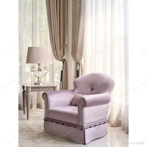Finley Lilac Velvet Armchair with Curved Lines and Fringe in plum — in a room setting