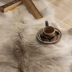 Finnish Reindeer Hide Rug in slate — in a room setting