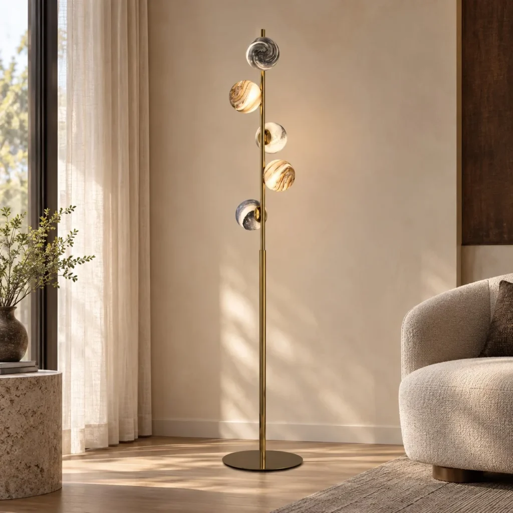 Five Stone-Pattern Disc Floor Lamp on Brass Stem in brushed brass — front view