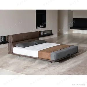 Floating Light Italian Leather Bed with Soft Backrest in clay — in a room setting