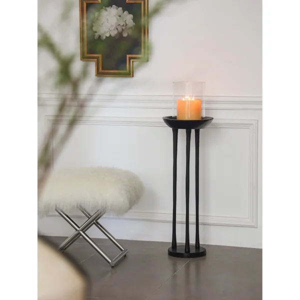 Black Wood Tripod Floor Candle Holder with Tray Top in black — in a room setting
