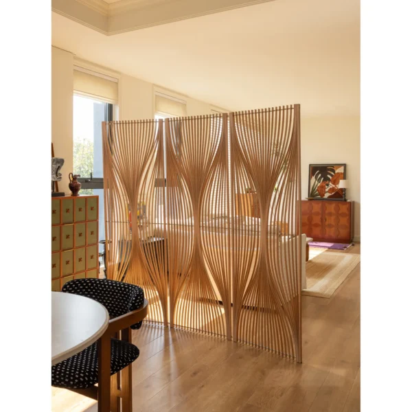 Flowing Cherry Wood Slat Folding Screen in natural oak — in a room setting