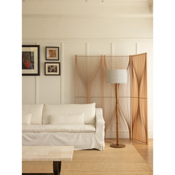 Flowing Cherry Wood Slat Folding Screen in natural oak — in a room setting