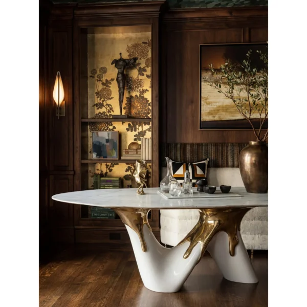 White Marble Table on Molten Gold Sculptural Base in ivory — in a room setting