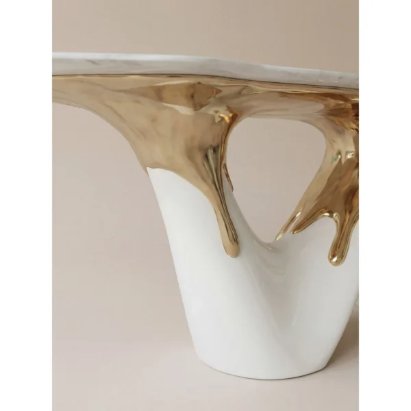 White Marble Table on Molten Gold Sculptural Base in ivory — in a room setting