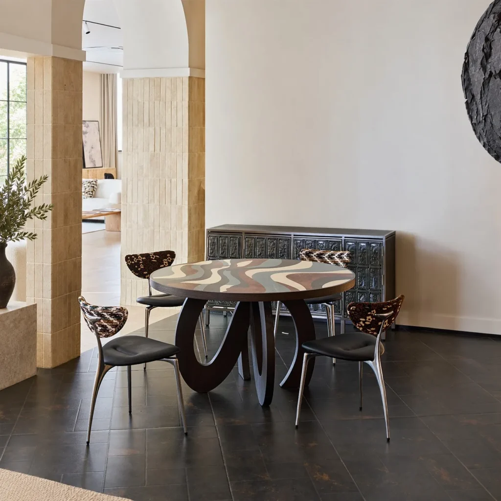 Flowing Marquetry Round Table on Sculptural Wave Base in clay — front view
