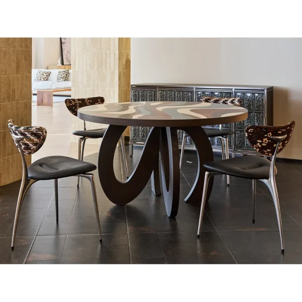 Flowing Marquetry Round Table on Sculptural Wave Base in clay — in a room setting